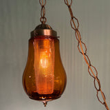 Pair of Vintage Pear-Shaped Amber Glass Globe MCM Pendants with Brass Plug-In Hardware